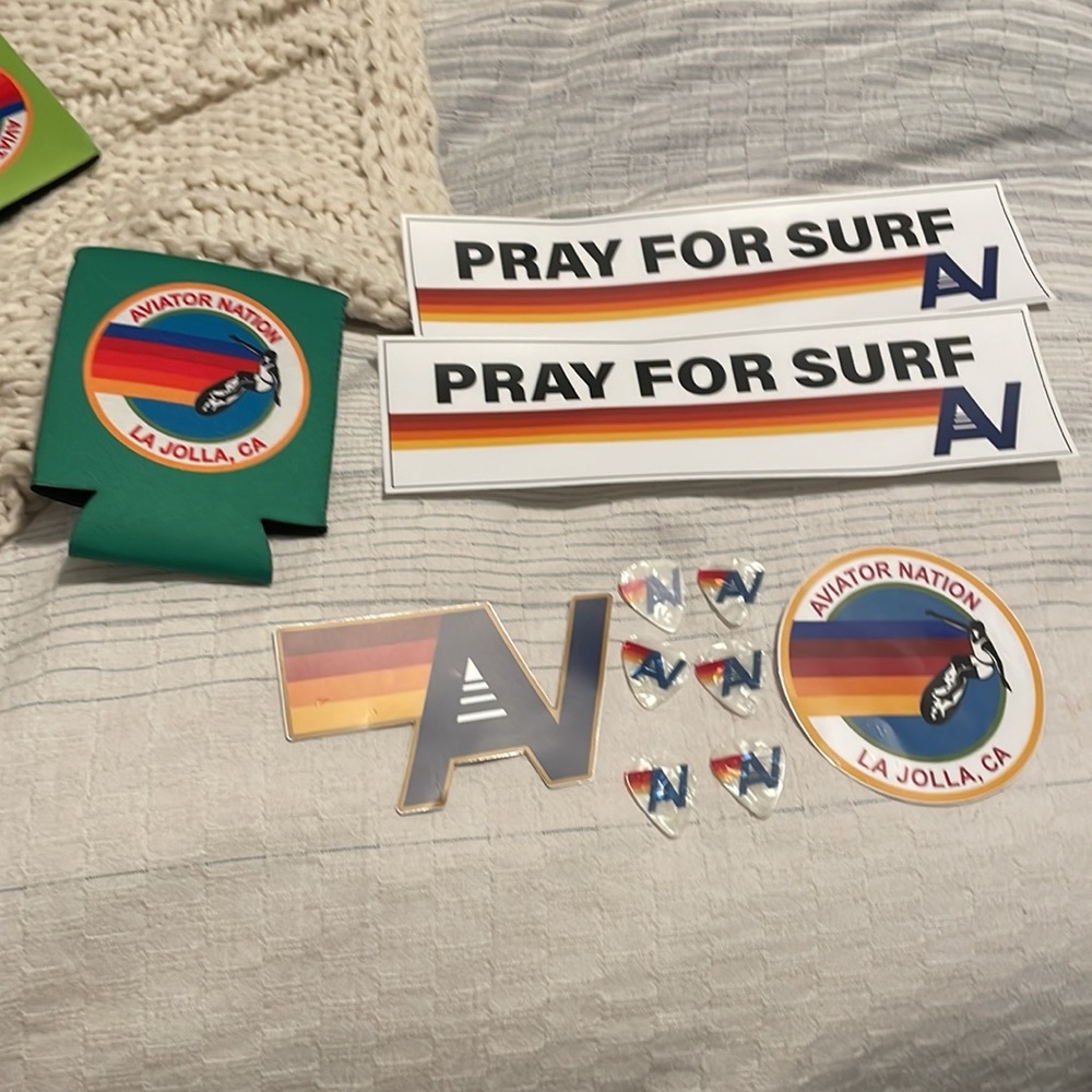 For aviator nation stickers and guitar pic plus a Cousy
